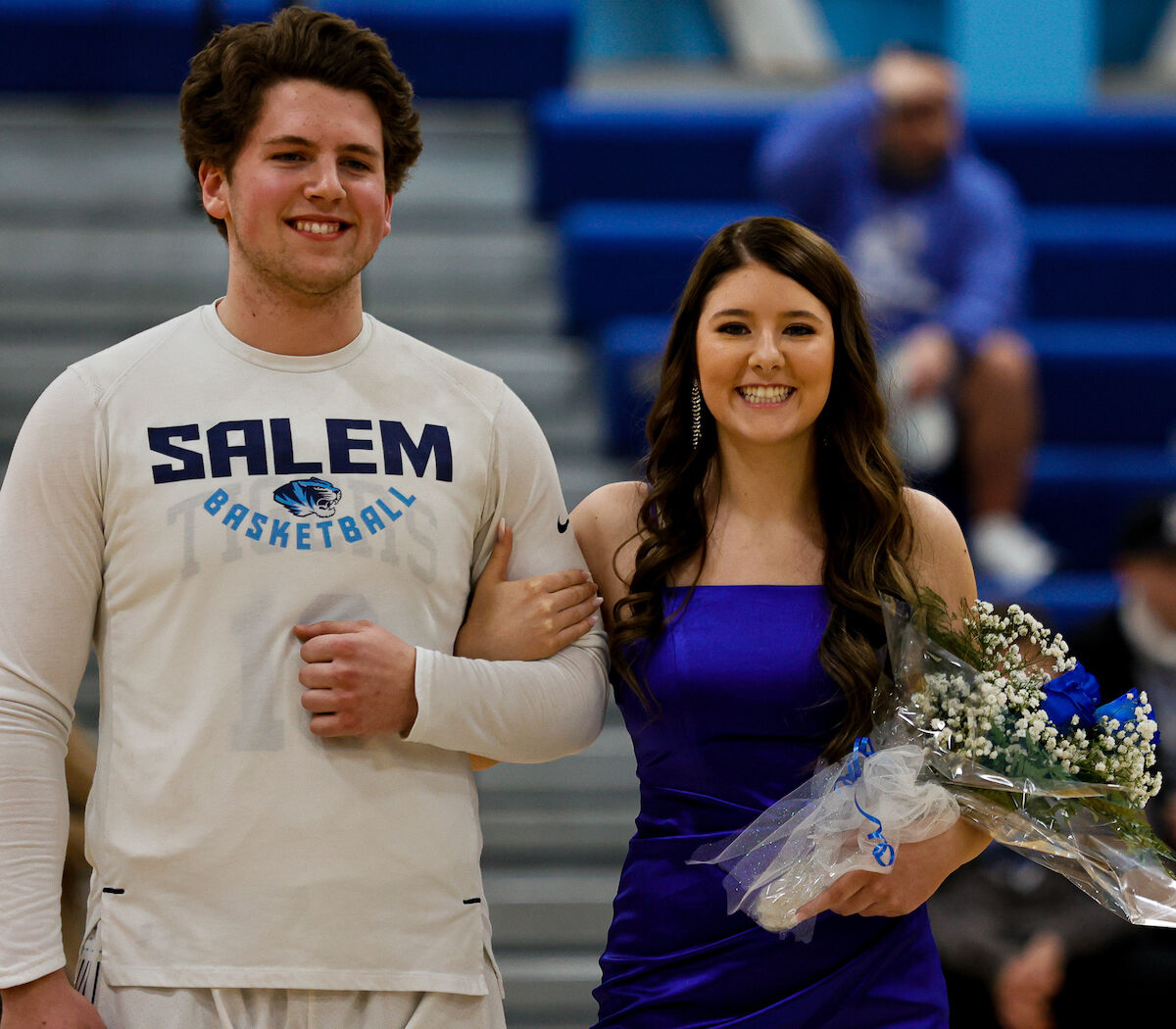 Senior candidate Alaina Ferguson escorted by Josh Artz